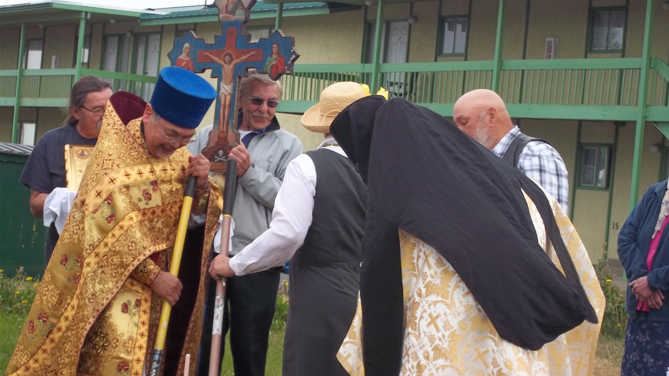Archimandrite David breaks ground for new building in Kenai, AK
