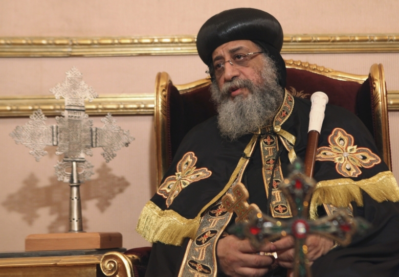 Coptic Pope Tawadros II, head of Coptic Orthodox church, talks to Reuters during an interview in Cairo, April 25, 2013. Egypt's Christians feel sidelined, ignored and neglected by Muslim Brotherhood-led authorities, who proffer assurances but have taken little or no action to protect them from violence, the pope said. In his first interview since emerging from seclusion after eight people were killed in sectarian violence between Muslims and Christians this month, the pope called official accounts of clashes at Cairo's Coptic cathedral on April 7 "a pack of lies". Picture taken April 25, 2013.PHOTO: REUTERS / ASMAA WAGUIH