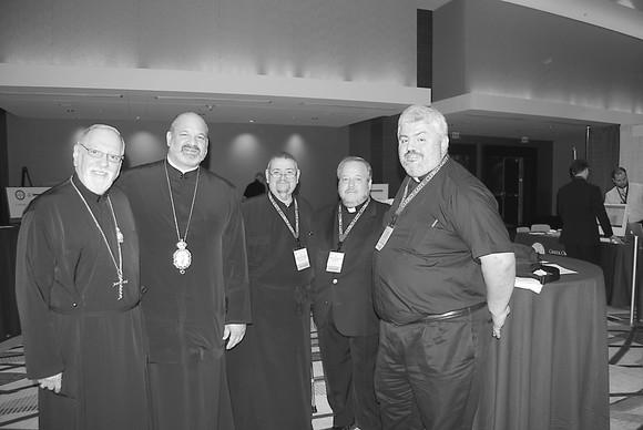 A group of Greek clergy, including Archimandrite Evgenios Papas, Bishop Dimitrios of Mokissos, Fr. George Delis, Archimandrite Timothy Bakakos, and Fr. Ioannis Kalomas at the Clergy Laity Congress in Atlanta GA in 2010.