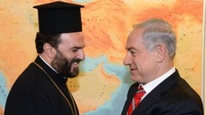 Prime Minister Benjamin Netanyahu meets Father Gabriel Nadaf in his Jerusalem office, August 5, 2013 (photo credit: Moshe Milner/Flash90/GPO)