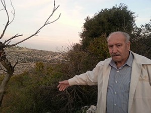 (Palestinian Christian Musa, a Greek Orthodox from Beit Jala, points to his land in the Cremisan Valley that is likely to be confiscated by the Israeli government for the construction of the Israeli separation wall in that area © Aid to the Church in Need)