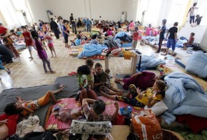 Iraqi Christian families fleeing the violence in the village of Qaraqush and Bartala, about 30 kms east of the northern province of Nineveh, are pictured at a community center in the Kurdish city of Arbil in Iraq’s autonomous Kurdistan region, on June 27, 2014. Iraq’s top Shiite cleric urged the country’s fractious political leaders to unite and form a government to help see off advances by Sunni militants who have overrun swathes of territory. AFP PHOTO/KARIM SAHIB