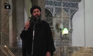 A man purported to be the reclusive leader of the militant Islamic State Abu Bakr al-Baghdadi has made what would be his first public appearance at a mosque in the centre of Iraq's second city, Mosul, according to a video recording posted on the Internet on July 5, 2014.REUTERS/Social Media Website