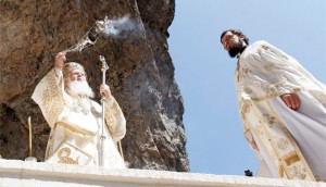 Ecumenical Patriarch Bartholomew of Constantinople celebrates an Orthodox liturgy for the feast of the Dormition of Mary at the Panagia Soumela Monastery near Trabzon, Turkey in August 2010. The Patriarch will preside over the Orthodox council to be held in Constantinople in 2016. (CNS photo/Umit Bektas, Reuters)