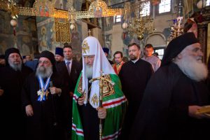 Patriarch Kirill, center, at a liturgy in Karyes, Greece, in May. The Russian Orthodox Church has increasingly sought to assert itself as the pre-eminent voice of the Orthodox faith. Credit Darko Bandic/Associated Press
