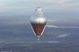 Mr Konyukhov is pictured floating at more than 6,000 metres (20,000 feet) close to Northam, Western Australia in his helium and hot-air balloon as he makes a record attempt to fly solo in a balloon around the world nonstop