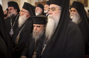 In this Saturday, June 18, 2016 photo released by the Holy and Great Council, Orthodox patriarchs taking part in the historic gathering celebrate the vespers of Pentecost in Heraklion, on the island of Crete. (Credit: Sean Hawkey/Holy and Great Council via AP.)