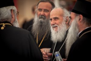 In this Wednesday, June 22, 2016 photo released by Holy and Great Council, Patriarch Irinej of Serbia, second right, talks with Senior Clergy during a brake of the Orthodox Synod in the Greek Island of Crete. The leaders of the world's Orthodox Christian churches have gathered on the Greek island of Crete for a landmark meeting, despite a boycott by the Russian church and three other churches. (Holy and Great Council via AP) Sean Hawkey, AP