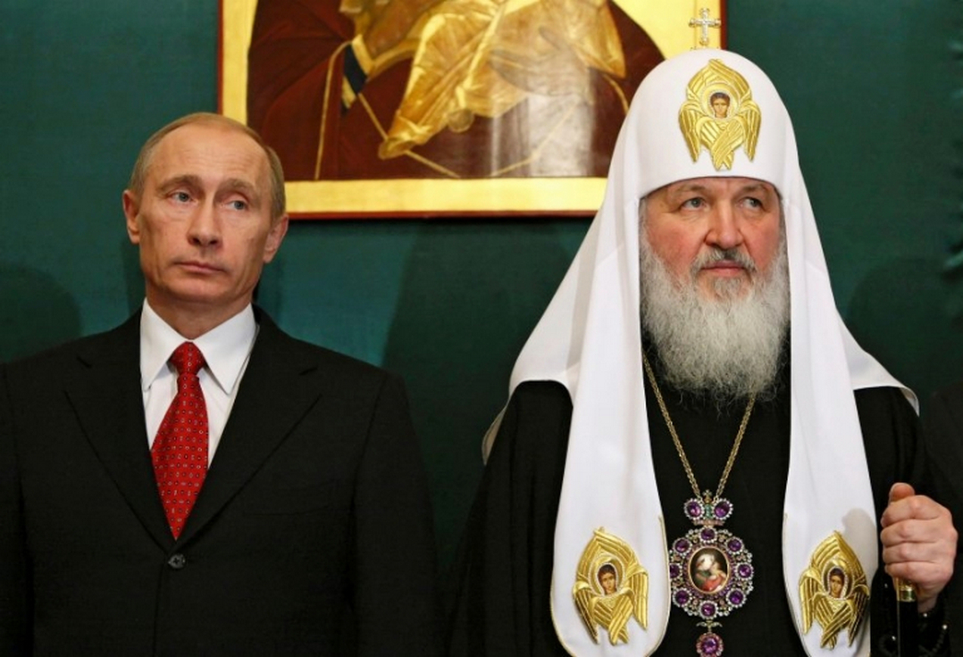 Russian Prime Minister Vladimir Putin, left, and Russian Orthodox ...